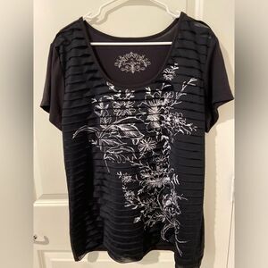 Black layered t-shirt with white floral graphics